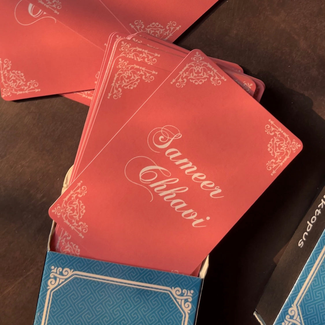 A deck of custom playin cards with the couples names